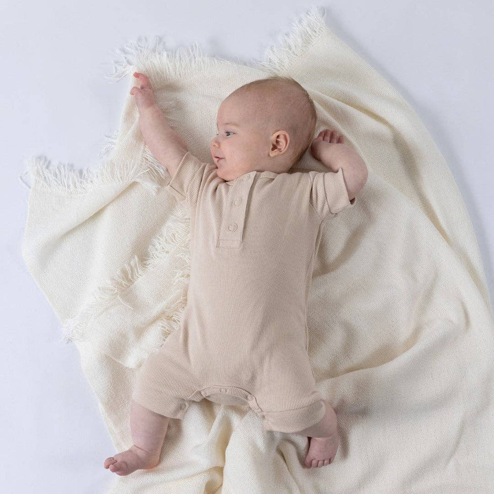 
                  
                    Playsuit: Oat
                  
                