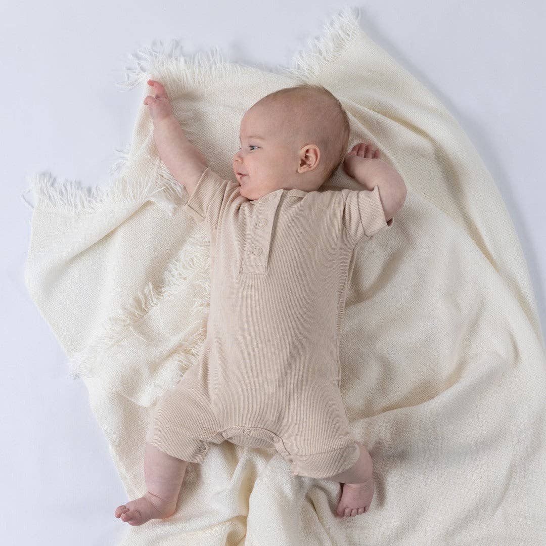 
                  
                    Playsuit: Oat
                  
                