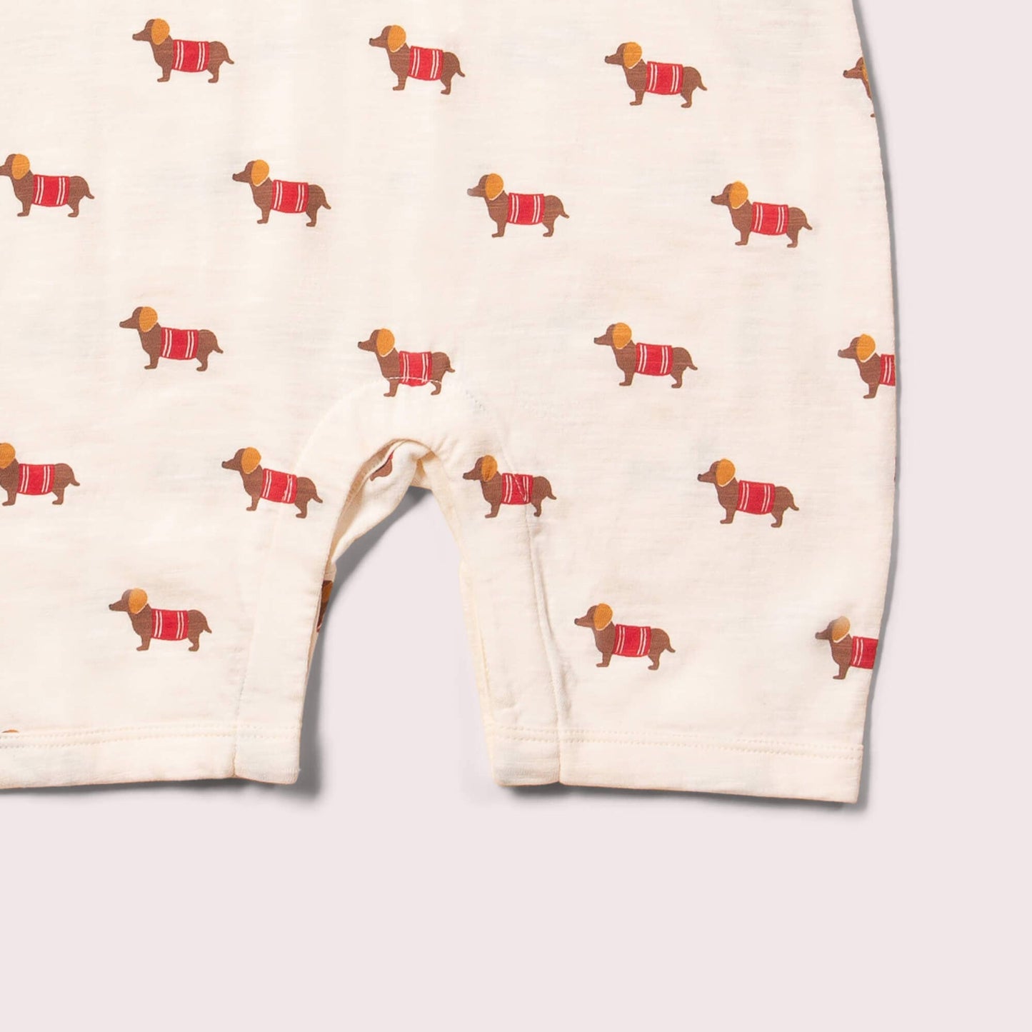 
                  
                    Sausage Dogs Romper
                  
                