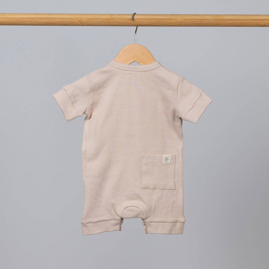 
                  
                    Playsuit: Oat
                  
                