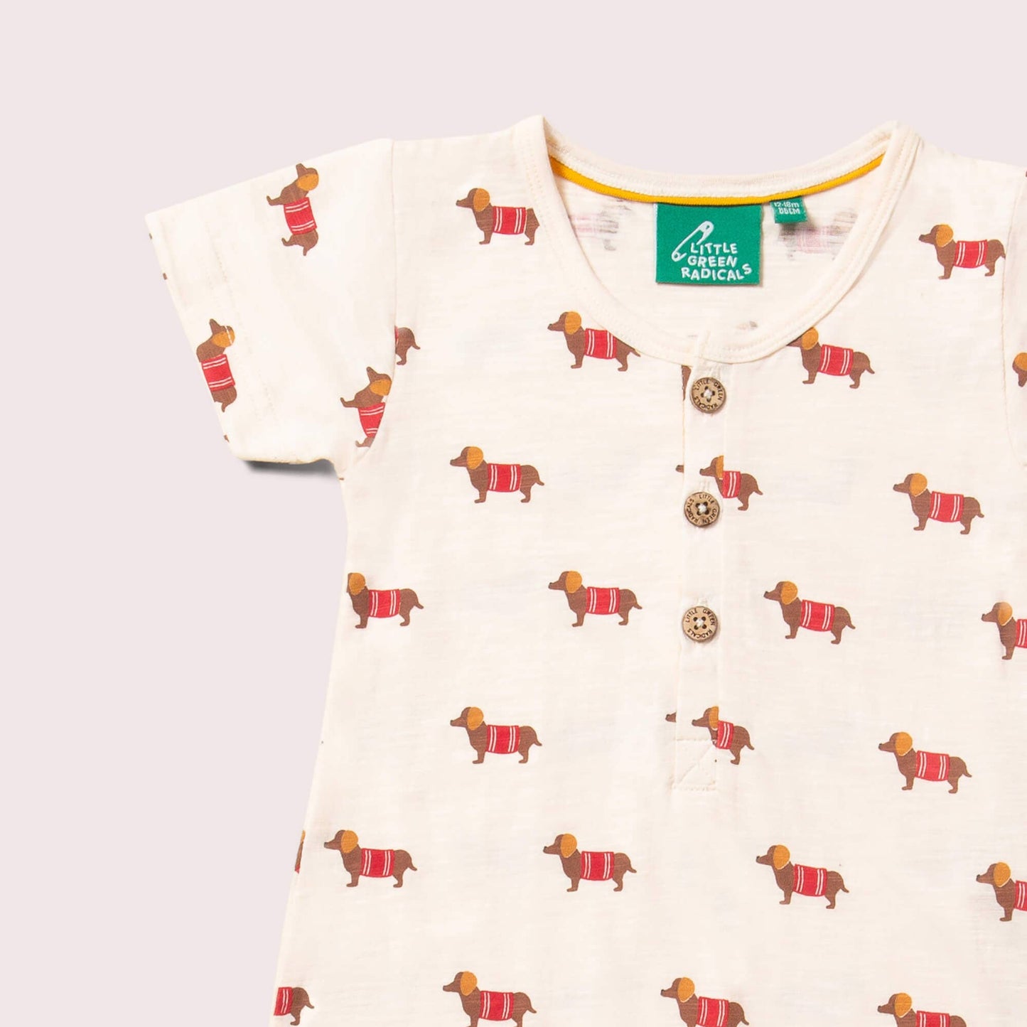 
                  
                    Sausage Dogs Romper
                  
                
